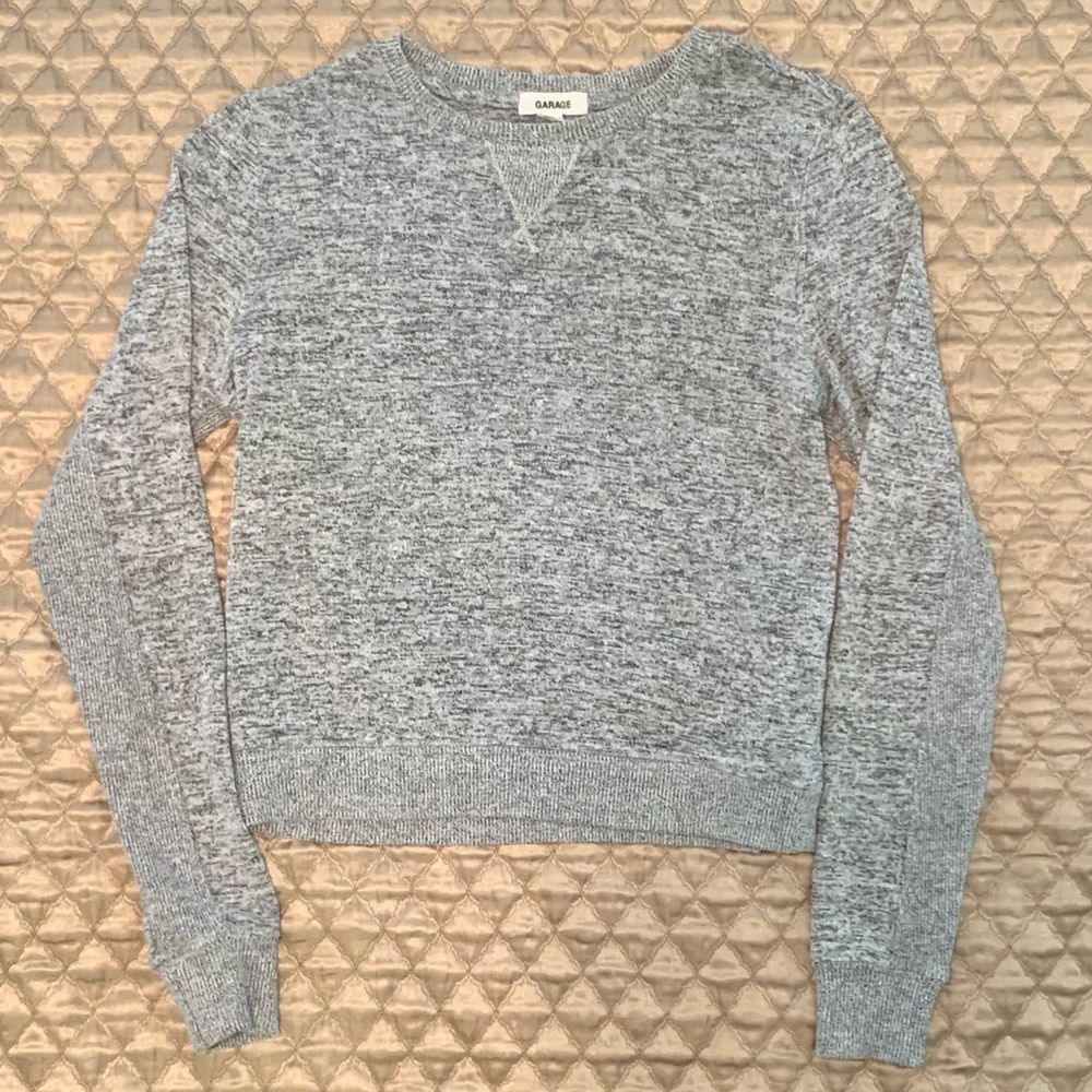 Garage pullover sweater, detail on back underside of arm for subtle style
